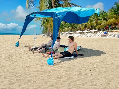 SHARK FIN SHADE Beach Tent Wind Sun Canopy Portable Easy Set Up UPF 50+ No Assembly Required 3-30 MPH - 1 to 8 People - Tie Downs Included - 2 Sizes Large 9' X 10' & Giant 13.5' X 10' PATENTS PENDING in Saudi Arabia
