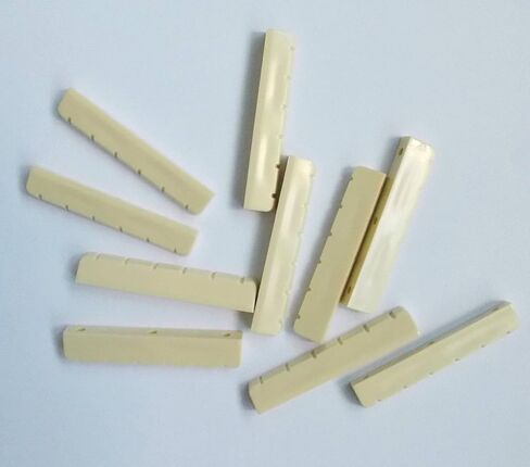 Generic 10 pcs Classical Guitar Nuts Plastic 52.5 x 6 x 9.3-8.8 Ivory in Saudi Arabia