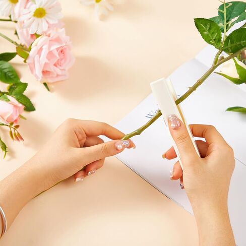 Rose Thorn Remover - Iron and Plastic surround.Ensuring Pain-Free Thorn Removal for Your Beautiful Roses! Effortlessly (Pink, 14cmx3.5cmx2.5cm) (PINK) in Saudi Arabia