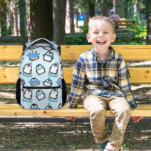 Kids School Backpack - 17 Inch Cute Penguin Bookbag for Girls - Durable Black School Bag for Elementary & Travel in Saudi Arabia