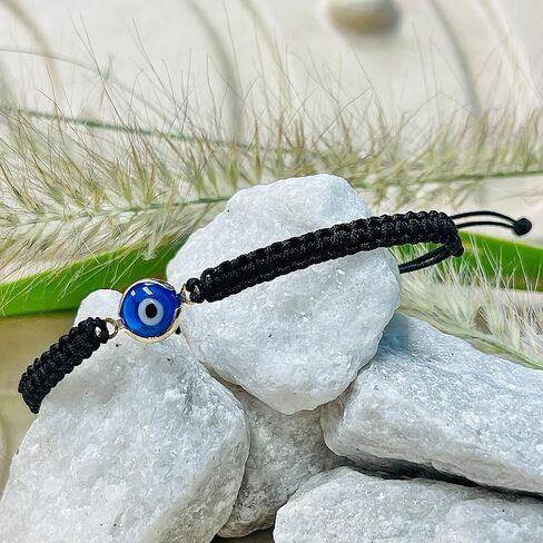 Evil eye handmade strand bracelet with gold plated trimming around eye 2634 in Saudi Arabia