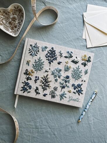شركة RIFLE PAPER CO. كتاب الزوار من القماش المطرز Wildwood | غلاف صلب مغلف بقطعة قماش كتاب وعلامة مرجعية بشريط Grosgrain، (تجليد مسطح، 144 صفحة مسطرة بحبر ذهبي معدني، 8 بوصة طول × 5.75 بوصة عرض) in Kuwait