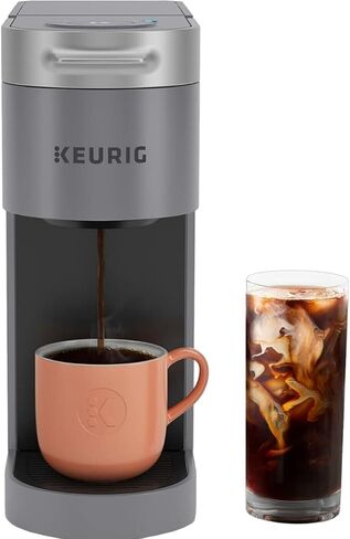 ماكينة صنع القهوة بخزان مياه من Keurig K-Slim Plus مثلجة على الجليد متعددة الأكواب (رمادي) مع 12 قطعة من متجر الدونات، كوب K-Cup وأكواب تنظيف متوسطة الشواء (3 قطع) in Kuwait