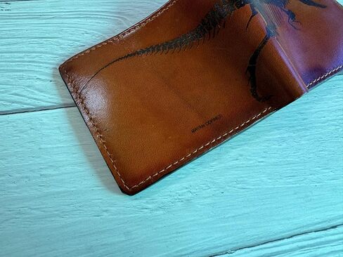 Skeleton leather wallet, dinosaur skeleton leather gift ideas, tyrannosarus T-rex fossil leather wallet, dinosaur gift ideas for men in Saudi Arabia