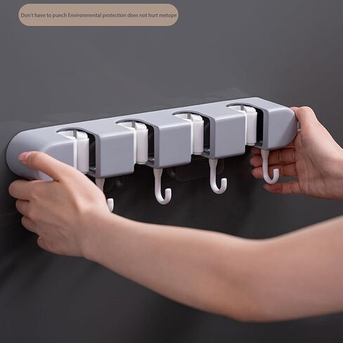 حامل مكنسة وممسحة مثبت على الحائط، 5 خطافات و4 فتحات، منظم رف أدوات الحديقة اللاصق لغرفة غسيل المرآب في الخزانة، شماعة مضادة للانزلاق للمكانس والمماسح والمكابس ومجارف الغبار، 13 × 2.2 × 1.8 بوصة in Kuwait