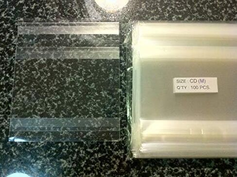 100 قطعة من أغلفة الأقراص المضغوطة وأقراص DVD المدعومة باللاصق الشفاف للمجلات والكتب ومجلدات الملفات in Kuwait