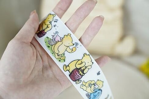 Winnie Ribbons 10 Yards Bear Ribbon for Decorations Baby Shower Party Birthday Decor Bear Ribbon Classic Grosgrain Ribbon (1 Roll - 0.86inch Wide, Winnie and Friends) in Saudi Arabia