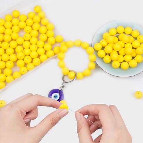 70Pcs Silicone Beads 15mm Round Silicone Beads Bulk for for DIY Keychain Making Jewelry Necklaces Silicone Focal Beads Loose Rubber Bracelet Beads (Yellow) in Saudi Arabia