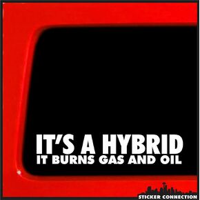 It's A Hybrid It Burns Gas and Oil - Bumper Sticker Decal for Car, Truck, Window, Laptop - 1.3" x 7" (White) (1)