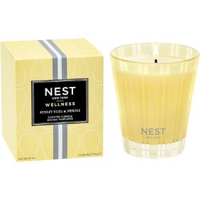 شمعة NEST New York الكلاسيكية المعطرة، يوزو وزهر البرتقال المضاء بنور الشمس - 8.1 أونصة - وقت احتراق يصل إلى 60 ساعة - وعاء زجاجي قابل لإعادة الاستخدام