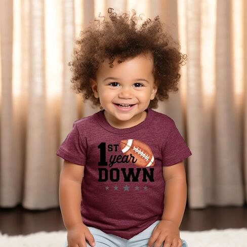قميص عيد الميلاد الأول لنجوم كرة القدم الرياضية من Olive Loves Apple 1st Year Down لزي عيد الميلاد الأول للرضع والأطفال الصغار in Kuwait