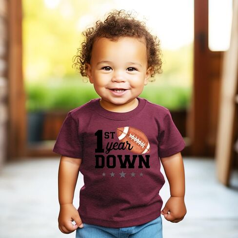 قميص عيد الميلاد الأول لنجوم كرة القدم الرياضية من Olive Loves Apple 1st Year Down لزي عيد الميلاد الأول للرضع والأطفال الصغار in Kuwait
