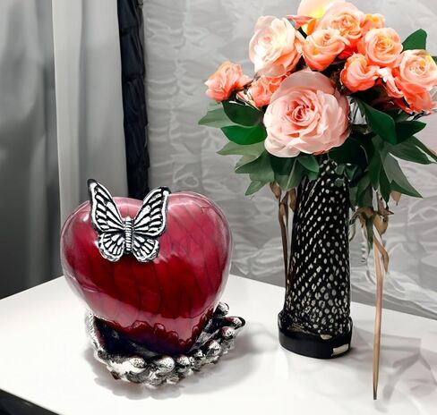 Butterfly Heart Urn for Ashes - Hand Painted with Red Color - Unique Memorial Keepsake for Loved Ones - Decorative Cremation Urn for Home or Office Comes with Unique Hand Shape Stand. in Saudi Arabia