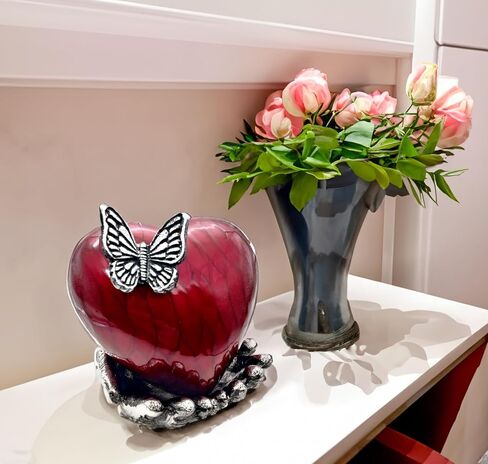 Butterfly Heart Urn for Ashes - Hand Painted with Red Color - Unique Memorial Keepsake for Loved Ones - Decorative Cremation Urn for Home or Office Comes with Unique Hand Shape Stand. in Saudi Arabia