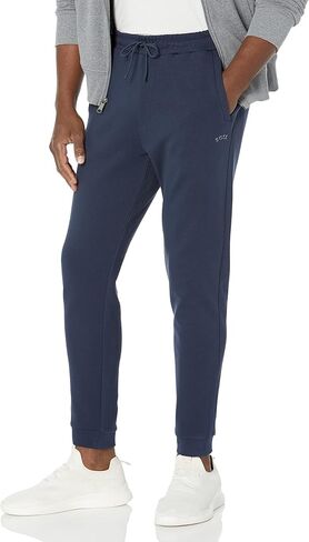 BOSS Men's Curved Logo Regular Fit Cuffed Sweatpants in Saudi Arabia