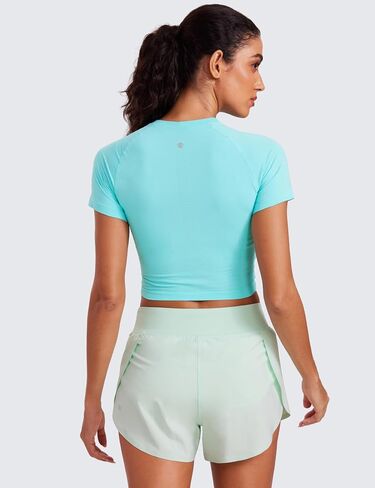 CRZ YOGA قطع علوية نسائية قصيرة الأكمام بدون خياطة قابلة للتنفس قمصان رياضية ضيقة مناسبة للتمرين في صالة الألعاب الرياضية قمصان رياضية أساسية للجري in Saudi Arabia