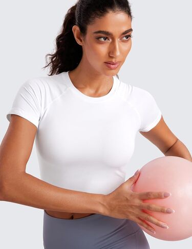 CRZ YOGA قطع علوية نسائية قصيرة الأكمام بدون خياطة قابلة للتنفس قمصان رياضية ضيقة مناسبة للتمرين في صالة الألعاب الرياضية قمصان رياضية أساسية للجري in Saudi Arabia