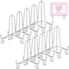 10 قطع من ألواح الحديد مقاس 6 بوصات للعرض، وحامل عرض حامل الأطباق الفضية، وحامل حامل للصور، وإطار الصورة، ولوحة الزخرفة، والطبق، والكتب وفن الطاولة in Kuwait