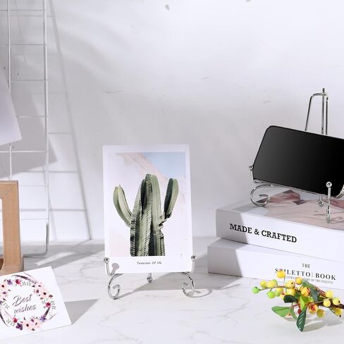 10 قطع من ألواح الحديد مقاس 6 بوصات للعرض، وحامل عرض حامل الأطباق الفضية، وحامل حامل للصور، وإطار الصورة، ولوحة الزخرفة، والطبق، والكتب وفن الطاولة in Kuwait