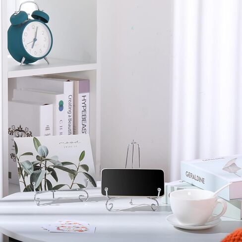 10 قطع من ألواح الحديد مقاس 6 بوصات للعرض، وحامل عرض حامل الأطباق الفضية، وحامل حامل للصور، وإطار الصورة، ولوحة الزخرفة، والطبق، والكتب وفن الطاولة in Kuwait