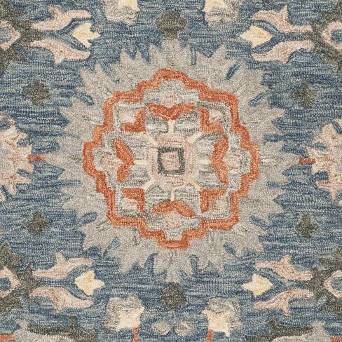 SAFAVIEH Aspen Collection Area Rug - 6' x 9', Blue & Rust, Handmade Boho Braided Tassel Wool, Ideal for High Traffic Areas in Living Room, Bedroom (APN123A) in Saudi Arabia