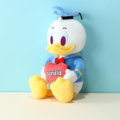 MINISO Disney Holding-Heart Plush Toy (Donald), Cuddly Stuffed Animal with Heart Emblem Soft and Huggable Collectible Toy for Disney Fans, Ideal for Bedtime Cuddles and Room Decor in Saudi Arabia