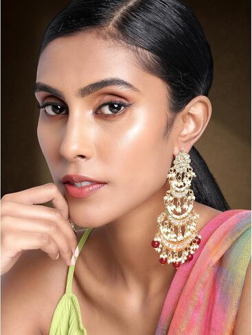 Aheli Gold Plated Long Chandbali Copper Green Dangle Earrings Glided with Kundan & Pearls in Saudi Arabia