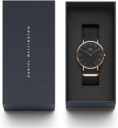 ساعة دانييل ويلينغتون الكلاسيكية قماش ذهبي وردي (بوليستر) in Kuwait