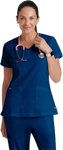 BARCO Grey's Anatomy Scrubs - Kira Scrub Top للنساء، رقبة على شكل حرف V، جيب بسحاب مطبوع عليه Love، قميص فرك نسائي فائق النعومة in Kuwait