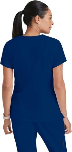 BARCO Grey's Anatomy Scrubs - Kira Scrub Top للنساء، رقبة على شكل حرف V، جيب بسحاب مطبوع عليه Love، قميص فرك نسائي فائق النعومة in Kuwait