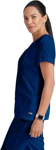 BARCO Grey's Anatomy Scrubs - Kira Scrub Top للنساء، رقبة على شكل حرف V، جيب بسحاب مطبوع عليه Love، قميص فرك نسائي فائق النعومة in Kuwait