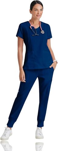 BARCO Grey's Anatomy Scrubs - Kira Scrub Top للنساء، رقبة على شكل حرف V، جيب بسحاب مطبوع عليه Love، قميص فرك نسائي فائق النعومة in Kuwait