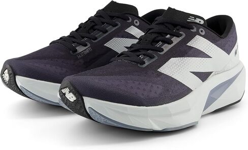 New Balance Men's FuelCell Rebel V4 Running Shoe, Graphite/Black/Quartz Grey, 13 in Saudi Arabia