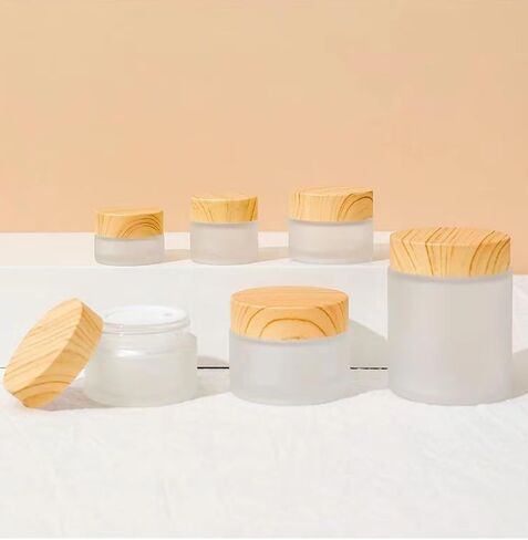 4Pcs 100g Glass Jars Round Cosmetic Container Jars with Wood Grain Lids,Empty Refillable Cosmetic Containers Pot Jars for Lotion,Cream,Ointments,Makeup,Scrubs Creams,Samples Pot,Travel Storage (Black) in Saudi Arabia