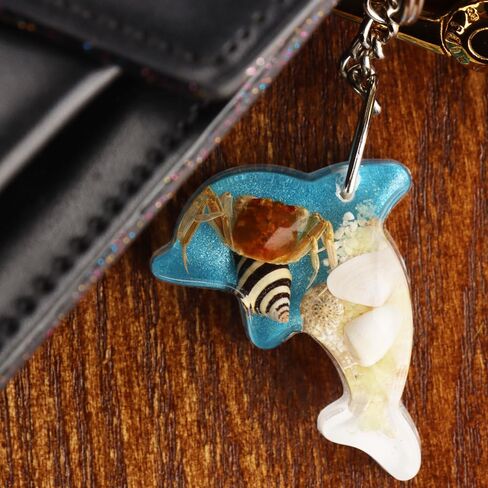 kcrygogo Glow in Dark Seashell Crab Dolphin Keychains Key Rings for Party Favor, Wonderful Little Gift for Man Or Woman(Blue) in Kuwait