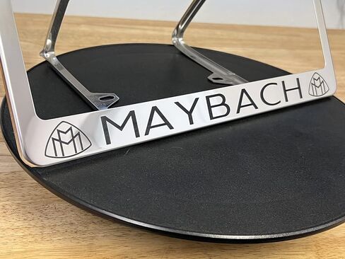 (Qty: 1 Frame) Compatible with Maybach License Plate Frame with Metal Caps Material: T304 Stainless Steel Color: Matte Black Lettering: Laser Etching in Saudi Arabia