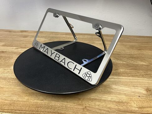 (Qty: 1 Frame) Compatible with Maybach License Plate Frame with Metal Caps Material: T304 Stainless Steel Color: Matte Black Lettering: Laser Etching in Saudi Arabia