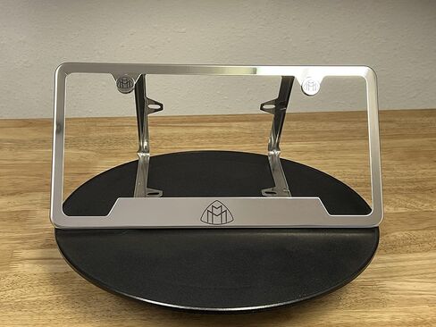 (Qty: 1 Frame) Compatible with Maybach License Plate Frame with Metal Caps Material: T304 Stainless Steel Color: Matte Black Lettering: Laser Etching in Saudi Arabia