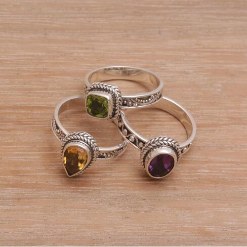 NOVICA Artisan Handmade Multigemstone Stacking Rings Sterling Silver Set of 3 Amethyst Citrine Peridot Cocktail Indonesia Birthstone [crown (amethyst) 0.3 in H x 0.4 in W x 0.2 in D Crown (citrine) 0] in Saudi Arabia