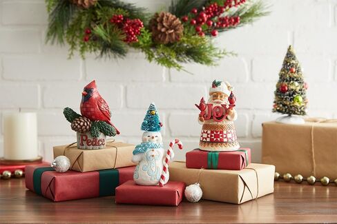 Enesco Jim Shore Heartwood Creek Santa مع تمثال بحجم نصف لتر من جوي آند كاردينالز، 5.24 بوصة، متعدد الألوان in Saudi Arabia