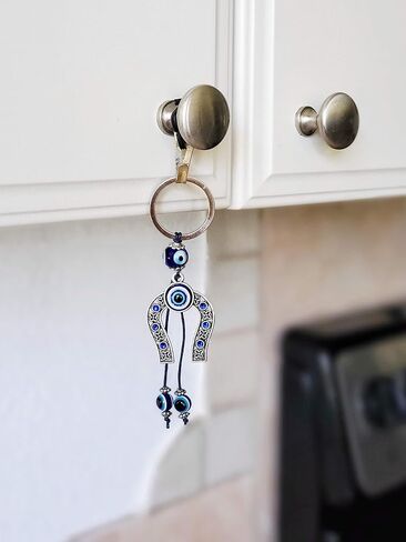 لاكبوستيوم سلسلة مفاتيح على شكل حدوة حصان من لاكي مع كريستال ازرق في المنتصف و2 عين شريرة متدلية من اجل الحظ السعيد والحماية - زينة معلقة للسيارة - مفاتيح المنزل والشنط وملحقات مراة الرؤية الخلفية in Kuwait