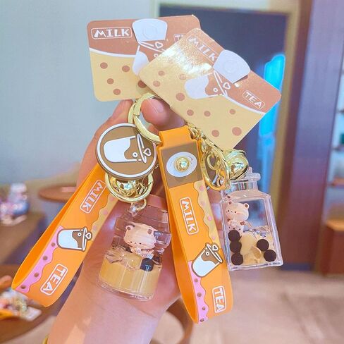 لطيف بوبا الدب المفاتيح Kawaii فقاعة الشاي السائل العائمة المفاتيح على ظهره معلقة in Kuwait