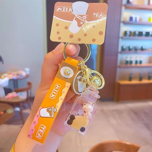 لطيف بوبا الدب المفاتيح Kawaii فقاعة الشاي السائل العائمة المفاتيح على ظهره معلقة in Kuwait