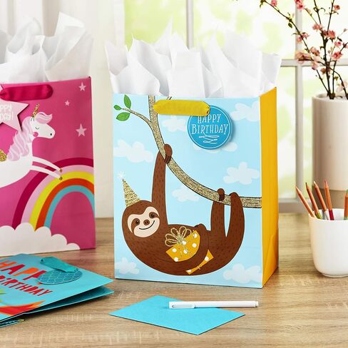Hallmark 13" Large Kids Birthday Gift Bags Assortment with Tissue Paper - Sloth, Dinosaur, Unicorn (Pack of 3 Gift Bags, 9 Sheets of Tissue Paper) in Saudi Arabia