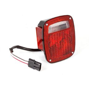 Omix-Ada | 12403.47 | Tail Light Assembly, Left, Black Housing | OE Reference: 56018649AC | Fits 1998-2006 Jeep Wrangler TJ