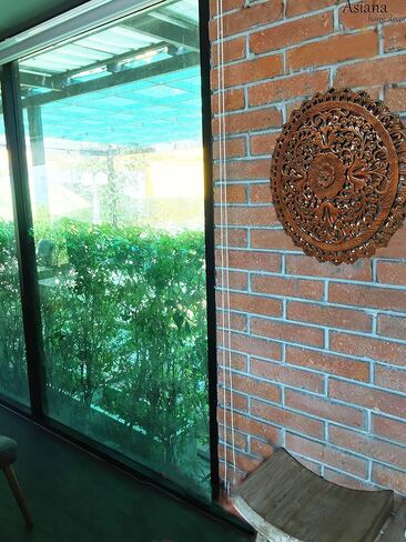 Tropical Bali Wood Carved Wall Art Plaque. Round Wood Wall Decor. Floral Wood Wall Hanging. 24" (Brown) in Saudi Arabia