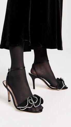 صندل نسائي من Loeffler Randall بكعب عالٍ ومكشكش ومطوي من Estella مع حزام للكاحل in Saudi Arabia