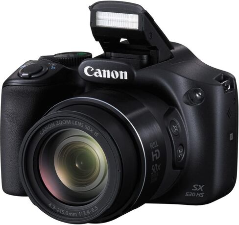 كاميرا Canon PowerShot SX530 HS الرقمية (9779B001) + 2 بطاقة ذاكرة سعة 64 جيجابايت + 3 بطاريات NB-6L + برنامج Corel للصور + شاحن + قارئ بطاقات + ضوء LED + حقيبة ناعمة + حامل ثلاثي القوائم مرن + المزيد (متجدد) in Saudi Arabia