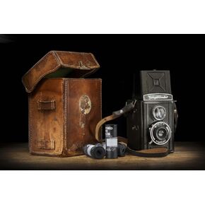 Vintage Voigtlander Brilliant camera with leather case and roll films. Poster Print by Loop Images Ltd. (17 x 11)