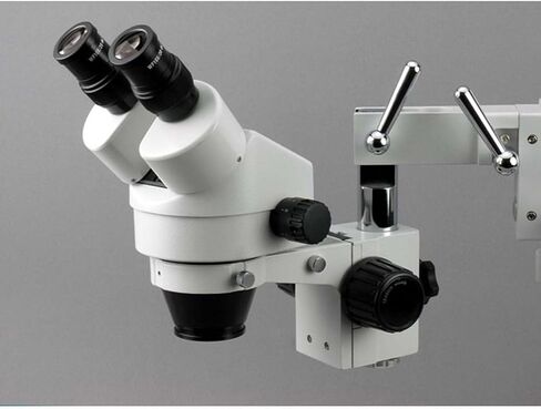 AmScope SM-3B-FRL Professional Binocular Stereo Zoom Microscope, WH10x Eyepieces, 7X-45X Magnification, 0.7X-4.5X Zoom Objective, 8W Fluorescent Ring Light, Single-Arm Boom Stand, 110V-120V in Saudi Arabia